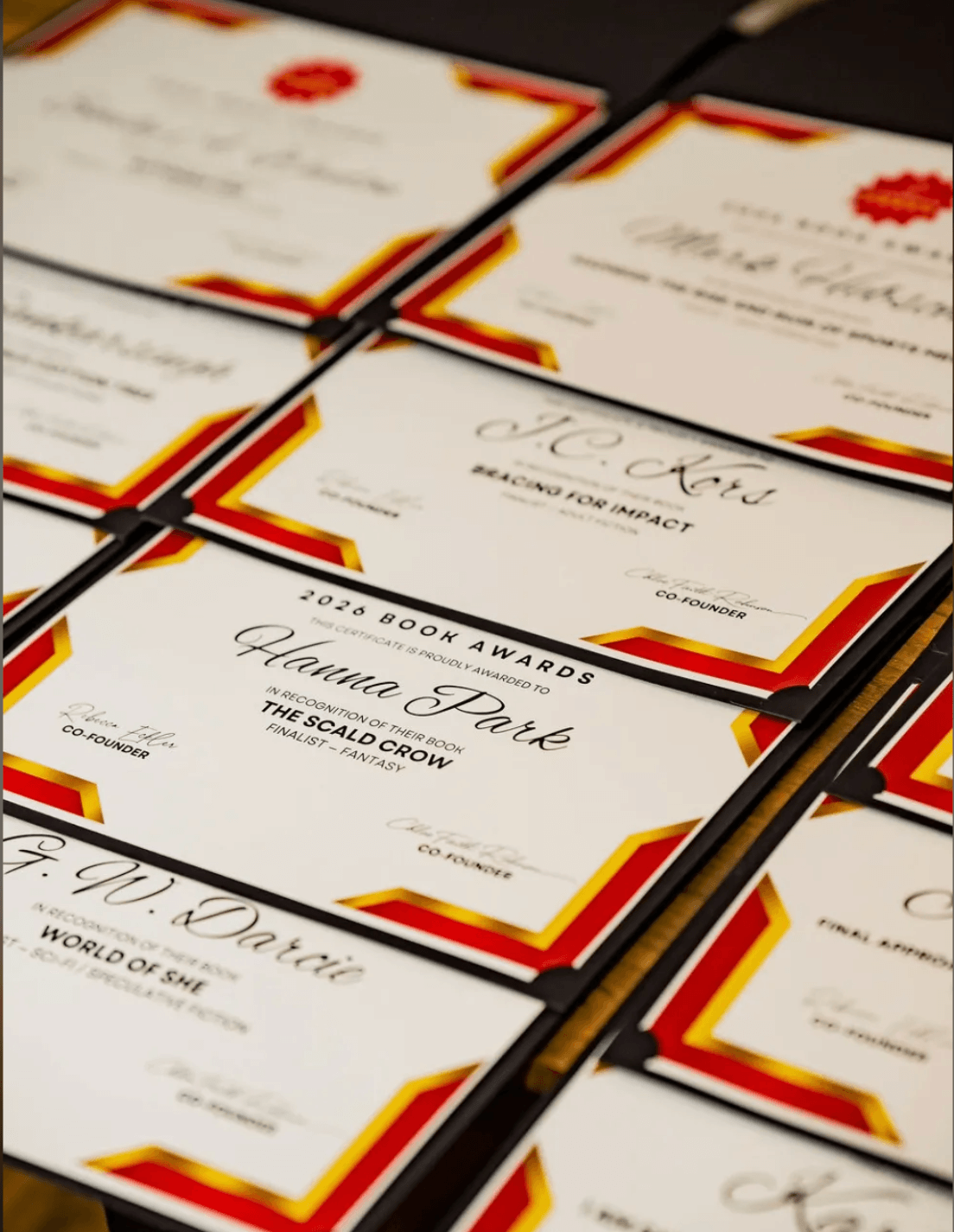 Award certificates arranged at the 2026 CANREADS Book Awards in Toronto